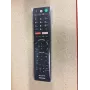 Pilot zdalnego sterowania Sony RMF-TX201ES z funkcją sterowania głosowego i podświetlanymi przyciskami do telewizora