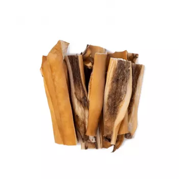 Przysmaki dla psów UNISZKI Skóra Wołowa 100 g — naturalne gryzaki dentystyczne ze skóry wołowej, saszetka 100 g, białko 65%