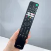 Pilot zdalnego sterowania Sony RMF-TX520E do telewizora Smart TV z funkcją sterowania głosowego i Bluetooth