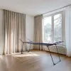 Suszarka do ubrań VILEDA Infinity Flex Ultimate Telescopic — czarna, aluminium lakierowane, 30 m powierzchni suszenia, składana, kółka