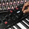 Kontroler klawiaturowy MIDI M-Audio Oxygen Pro 49 — 49 klawiszy, 16 padów, 9 suwaków, wyświetlacz OLED, USB, wyjście MIDI