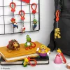 Zestaw breloczków Backpack Buddies Paladone Super Mario CDU 24 szt. – różne postacie, akcesoria kolekcjonerskie