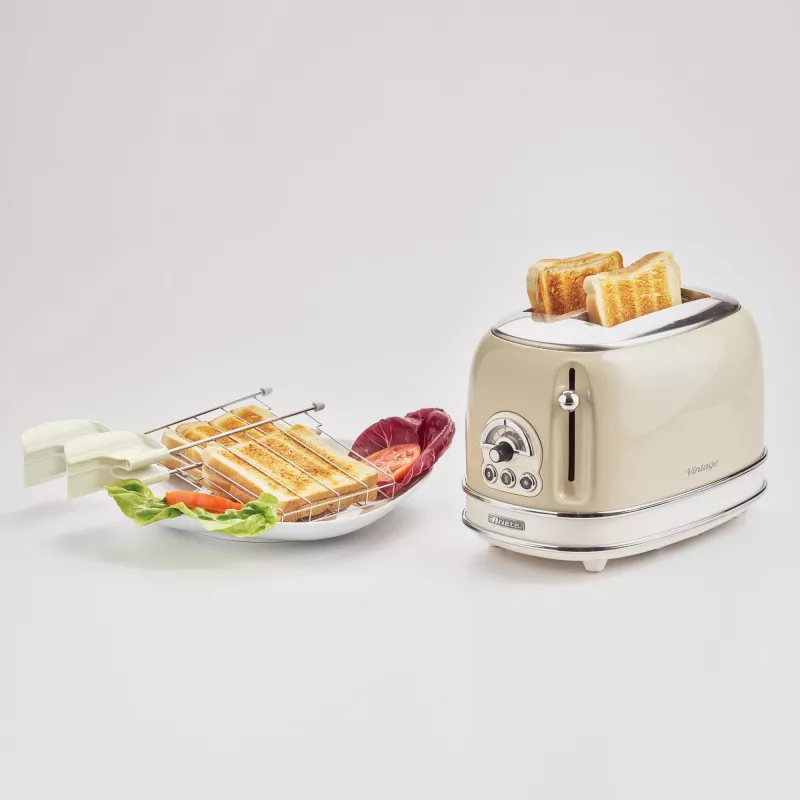 Toster Ariete 155 Design 2 kromki z koszykami do kanapek, 6 poziomów opiekania, 810 W, obudowa ze stali nierdzewnej, wysuwana tacka na okruchy, pastelowy beż