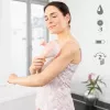 Ręczny masażer rolkowy Medisana AC 950 — bezprzewodowy Li‑Ion, 2 poziomy mocy, ergonomiczne uchwyty, 381 g, różowe złoto/biały
