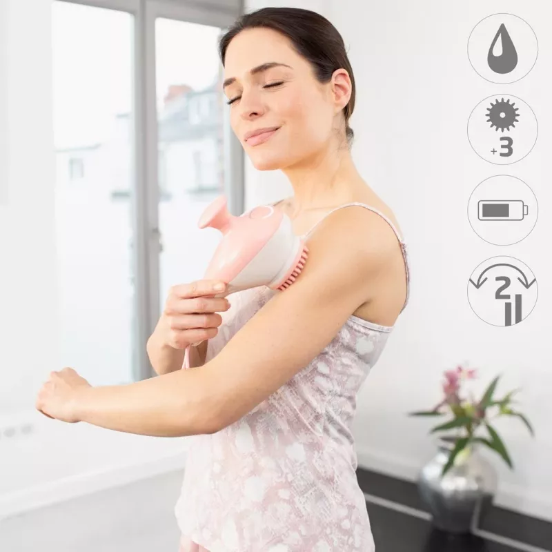 Ręczny masażer rolkowy Medisana AC 950 — bezprzewodowy Li‑Ion, 2 poziomy mocy, ergonomiczne uchwyty, 381 g, różowe złoto/biały