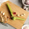 Handle garlic press Ototo Design Garligator zielony Plastic Steel