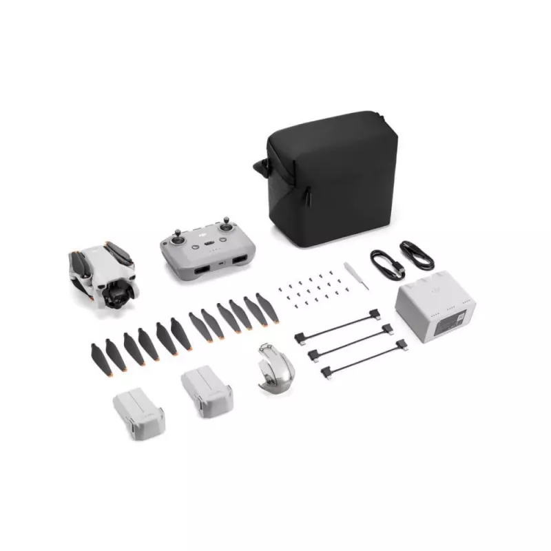 Kwadrokopter DJI Mini 3 Fly More Combo — dron 4-wirnikowy, kamera 12 MP 4K, zasięg 10 000 m, maks. prędkość 10,55 m/s, bateria 2453 mAh, 0,248 kg, szary