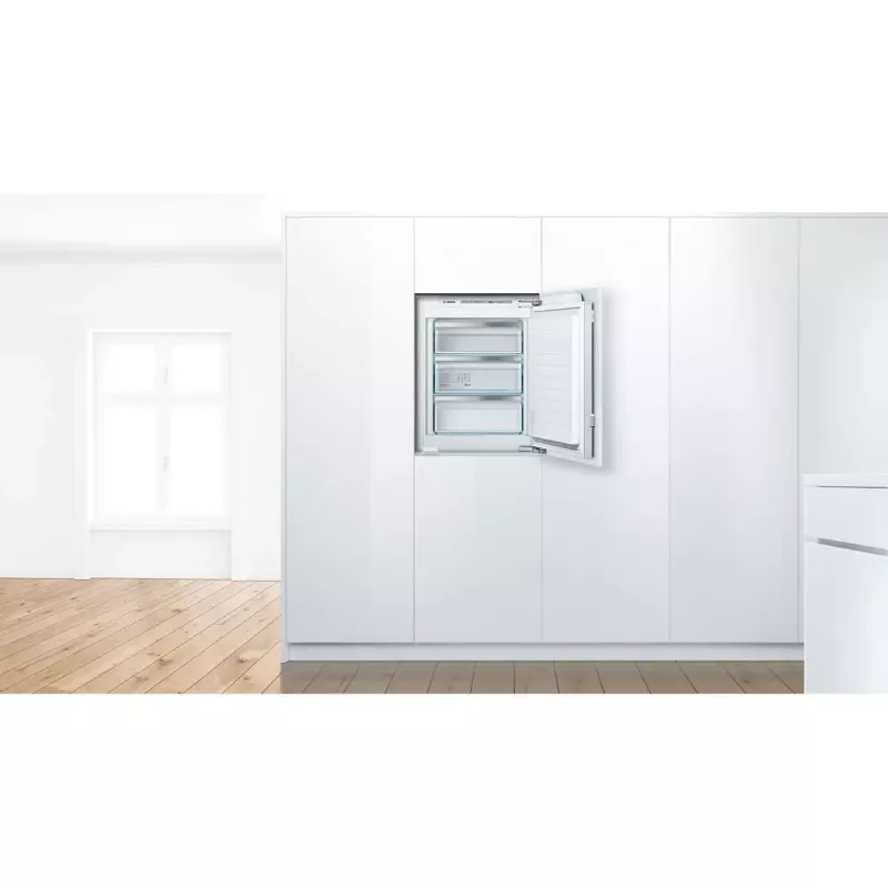 Wbudowana zamrażarka pionowa Bosch Serie 6 GIV11AFE0 — 72 l, sterowanie dotykowe, wyświetlacz LED, drzwi z możliwością zmiany kierunku otwierania, 36 dB