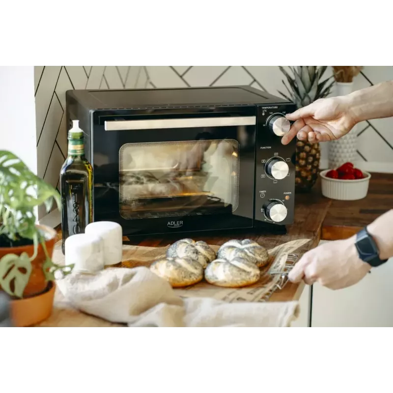 Elektryczny piekarnik stołowy Adler AD 6024 — kompaktowa pojemność 22 l, 1300 W, czarny
