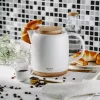 Czajnik elektryczny Adler AD 1304 — 1 l, 1200 W, obudowa ceramiczna, odchylana pokrywa, podstawa obrotowa 360°, biały