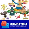 MEGA Pokémon Zestaw Klocków Karuzela Wesołe Miasteczko, z 4 Figurkami Akcji (393 Elementy) dla Dzieci