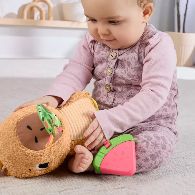 Zabawkowa kapibara Fisher-Price Snuggly Snacky Capy 0,5 roku