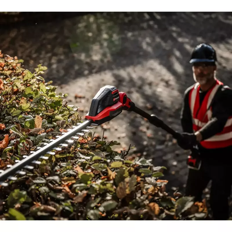 Bezprzewodowe nożyce do żywopłotu z wysięgiem teleskopowym EINHELL GP-HH 18/50 Li T BL-Solo — 18 V, 50 cm listwa tnąca, zasięg teleskopowy