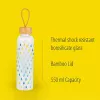 Szklana butelka Cambridge CM06991 550 ml z bambusową pokrywką
