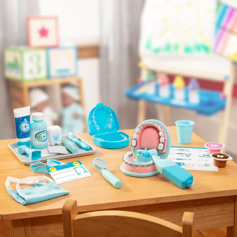 Zestaw dentystyczny zabawkowy Spinmaster Melissa & Doug Super Smile Dentist, odpowiedni od 3 lat, wielokolorowy