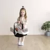 Fotelik samochodowy dla lalek Simba-Dickie Maxi-Cosi, beżowy — akcesorium dla lalek