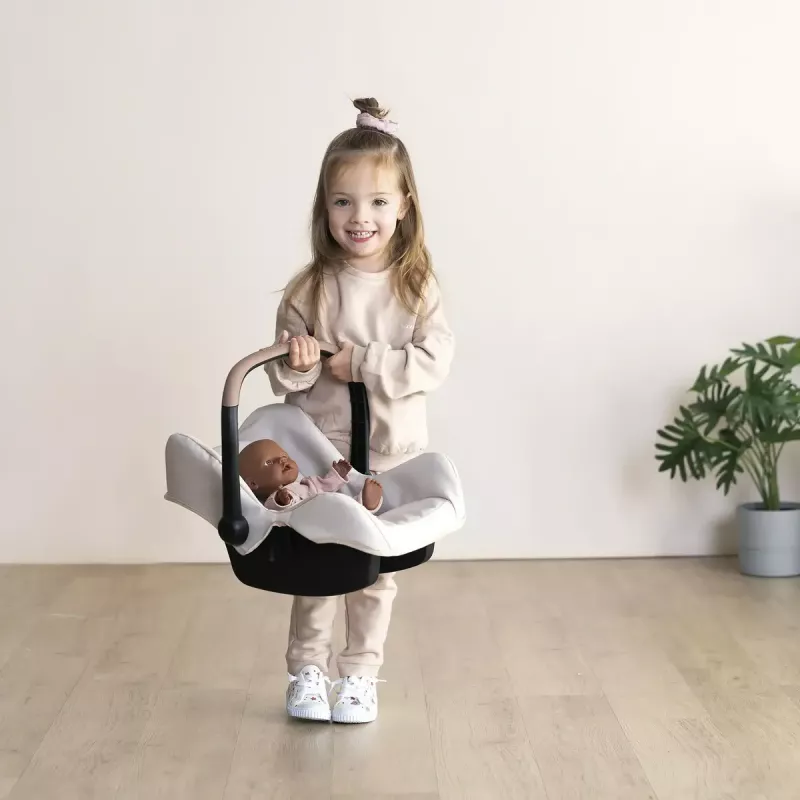 Fotelik samochodowy dla lalek Simba-Dickie Maxi-Cosi, beżowy — akcesorium dla lalek