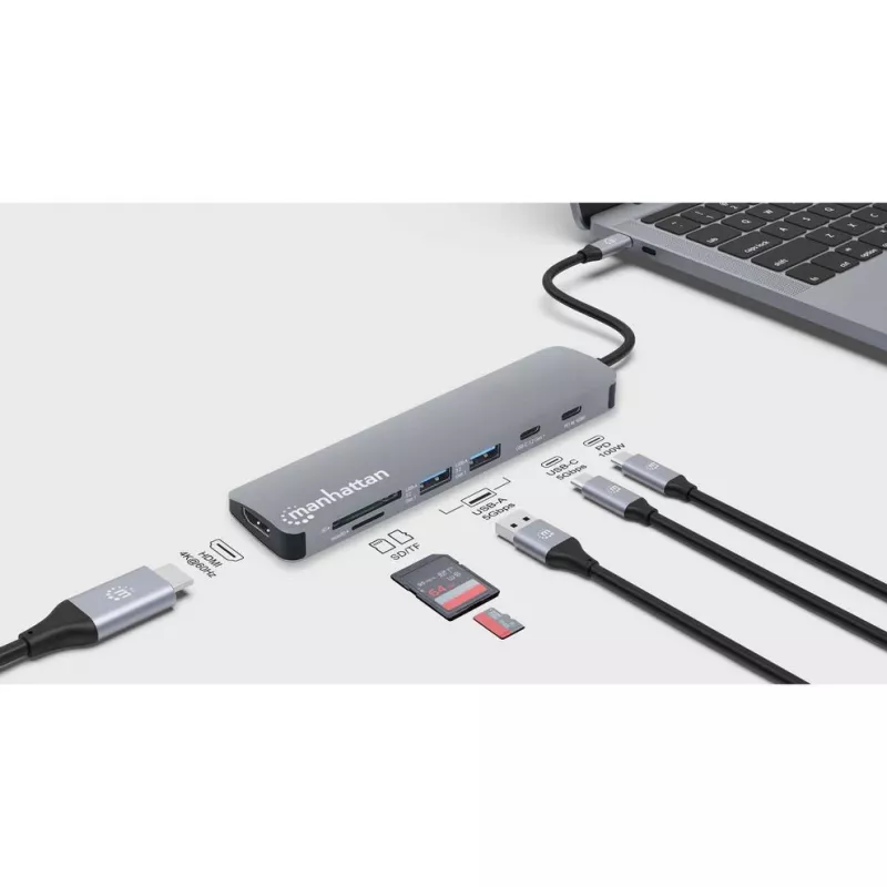Stacja dokująca / hub Manhattan USB-C z czytnikiem kart, porty (5 szt.): HDMI, USB-A (2 szt.) i USB-C (2 szt.), z Power Delivery (PD) 100 W – wymaga zewnętrznej ładowarki USB-C (brak w zestawie). Zasilana przez USB (bez zewnętrznego zasilacza), gdy PD nie jest używane