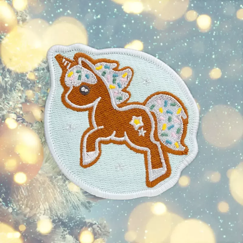 Badge LAUT MAGMOJI BADGE – Jednorożec Ciastko Edycja Świąteczna, PVC i Silikon, Brązowy/Jasnoniebieski, 1 szt.