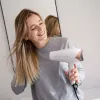 Suszarka do włosów Taurus STUDIO 2500 IONIC 2400 W biała z funkcją jonizacji, 3 poziomami grzania, 2 prędkościami, dyfuzorem i koncentratorem