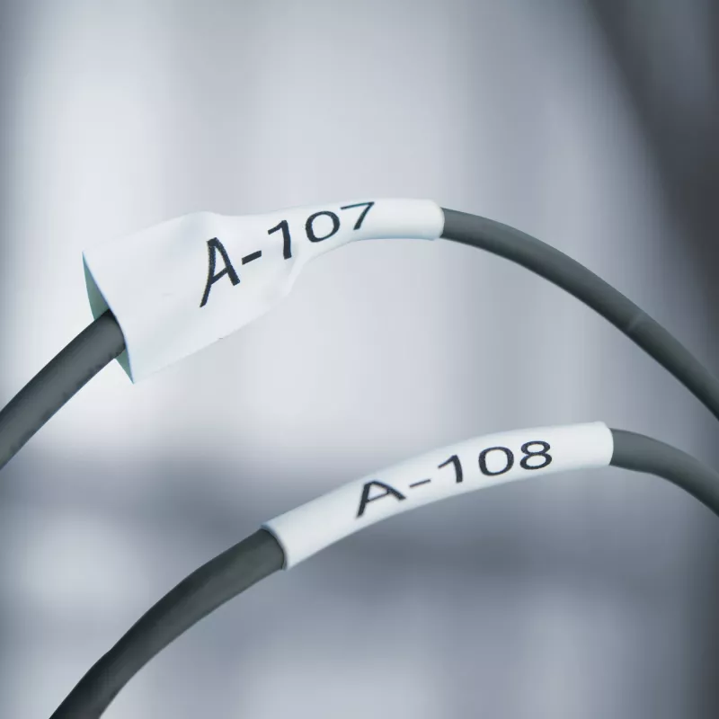 DYMO Rhino Industrial Heat-Shrink kabel Label Tubes | 24 mm x 1,5 m | Czarny nadruk na żółtym | do Rhino Label Makers