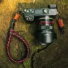 Pasek do aparatu MOBOTIX C-Rope Claw — nylonowy czerwony, maks. długość 30 cm, głębokość 430 mm