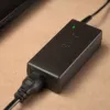 Ładowarka do laptopa Akyga AK-ND-85, zasilacz sieciowy do użytku wewnętrznego, wejście 100–250 V, wyjście 12 V 5 A, kabel 1,2 m, czarna