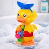 LEAN TOYS Interaktywna zabawka do kąpieli Kaczka z młynek, przyssawkami i łyżeczką