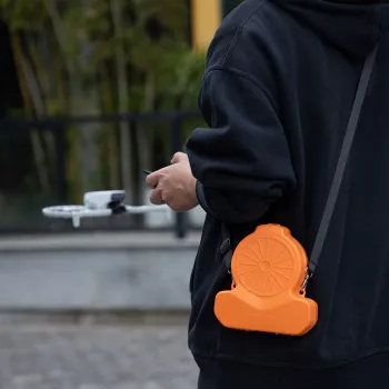 SUNNYLIFE Twarda walizka transportowa dla DJI Flip Drone z paskiem - Pomarańczowy / FP-SN953-C