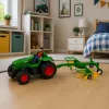 LEAN TOYS Ciągnik rolniczy zdalnie sterowany z grabiami do siana RC światła 1:24