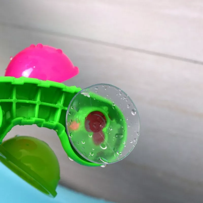 LEAN TOYS Zestaw do kąpieli Wiatrak wodny z przyssawkami Dwie łyżeczki Zabawka wodna
