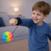 LEAN TOYS Piłka skacząca na gumce, sensoryczna, z wypustkami, kolorowa, 6 cm