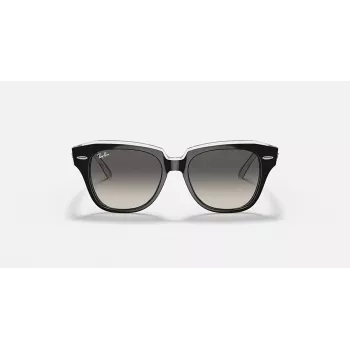 Ray-Ban RB9186S Okulary przeciwsłoneczne dziecięce 711611 Przezroczysta niebieska oprawka Soczewki gradientowe szare 46mm
