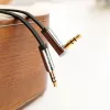 UGREEN AV119 Kabel aux płaski 3,5 mm z wtykiem kątowym 2 m - czarny/srebrny